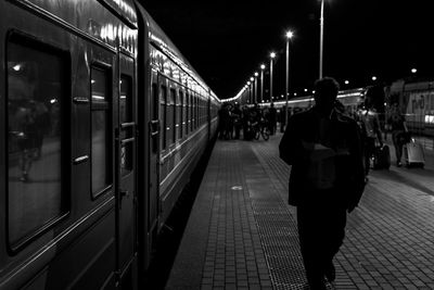 Man at railroad station