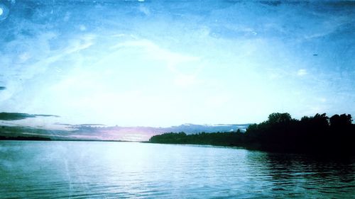 Scenic view of sea against blue sky