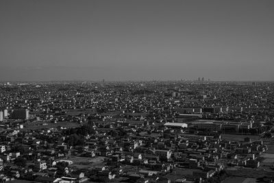 High angle view of illuminated cityscape against sky