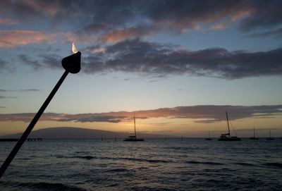 Scenic view of sea at sunset