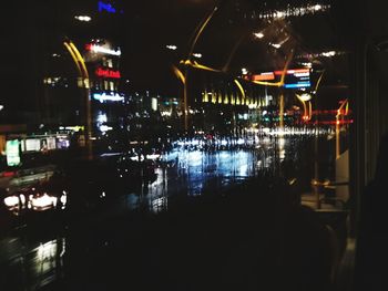 Illuminated water at night