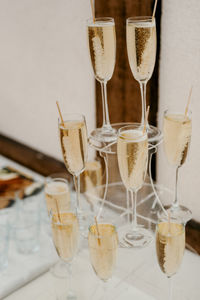 Close-up of wine glasses on table