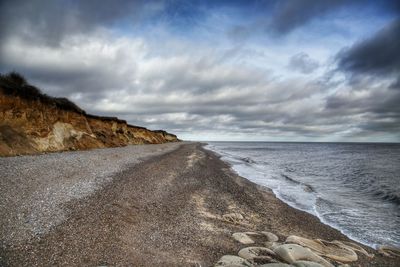 Scenic view of beach against sky