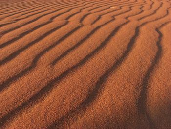 High angle view of shadow on sand