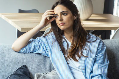 Young woman using mobile phone