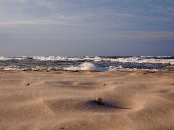 Scenic view of beach against sky