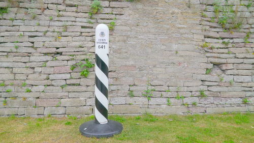 Text on stone wall