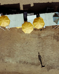 High angle view of woman standing on wall