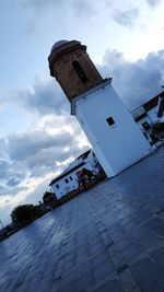 Low angle view of abandoned building against sky