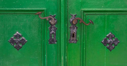 Closed green door of house