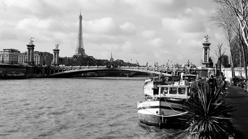 View of bridge over river in city