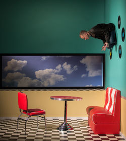 Man sitting on wall