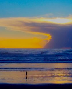 Scenic view of sea at sunset