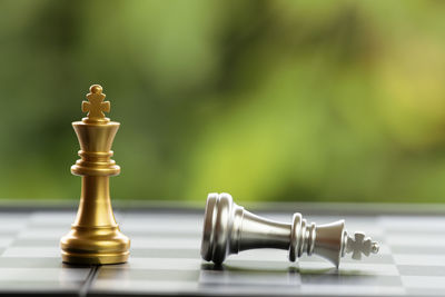 Close-up of kings on chess board