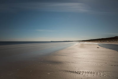 Scenic view of beach and baltic sea against sky