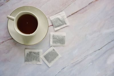 High angle view of coffee cup on table