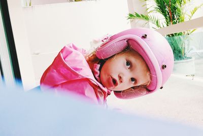 Portrait of cute girl wearing helmet