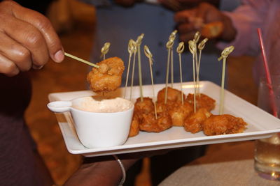 Close-up of hand holding food