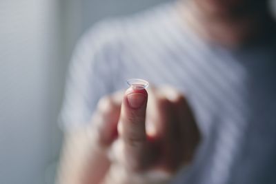 Close-up of man holding hand