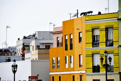 Low angle view of buildings against sky
