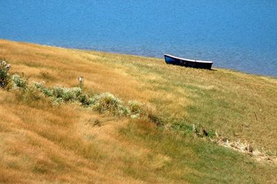 Scenic view of boats in sea against clear sky