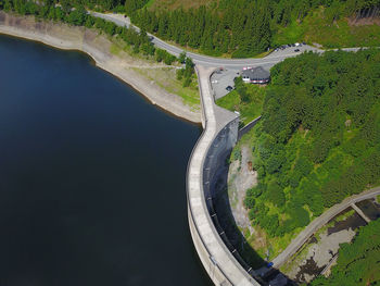 High angle view of dam by river against sky