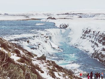 Scenic view of sea against sky during winter