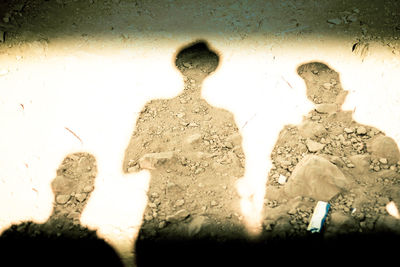 Silhouette people against blurred background