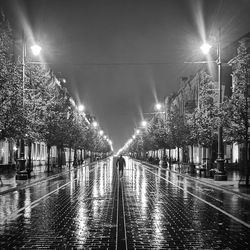 Illuminated street lights at night