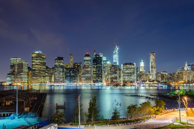 Scenic view at night of modern skyscrapers in lower manhattan, new york city, usa.