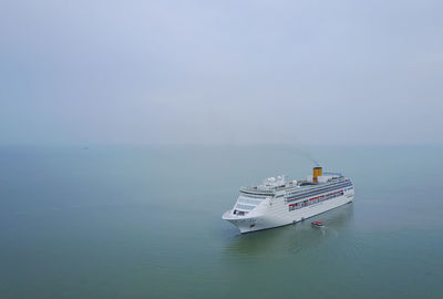 Boat in sea against sky