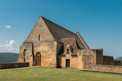 Historic building against clear blue sky