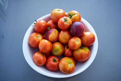 High angle view of tomatoes in bowl on table