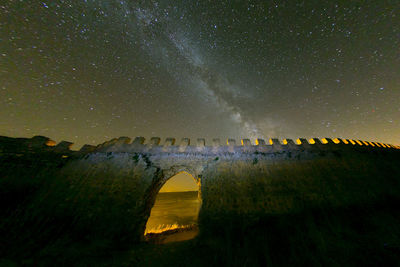 Scenic view of star field against sky at night