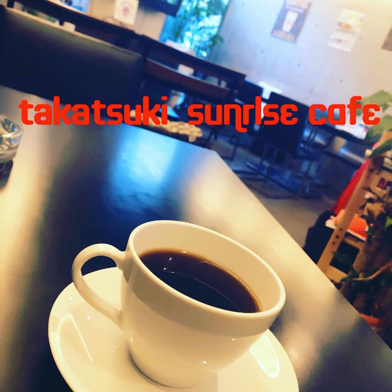 drink, cup, text, food and drink, refreshment, mug, coffee cup, coffee, western script, coffee - drink, indoors, no people, close-up, communication, still life, saucer, crockery, hot drink, table, tea, tea cup