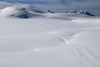 Snowy landscape in winter of alpe d'huez in the alps in the grandes rousses massif