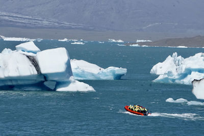 Boat in sea during winter