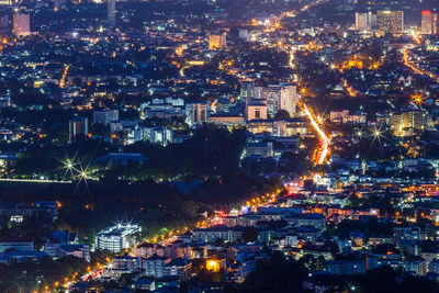 High angle view of illuminated cityscape at night