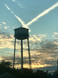 Low angle view of water tower against sky