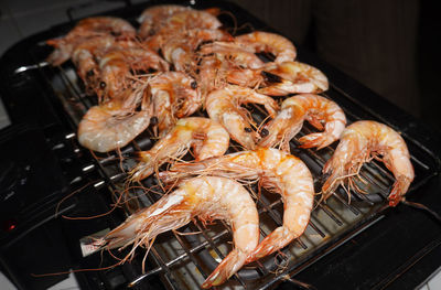 Close-up of meat on barbecue grill