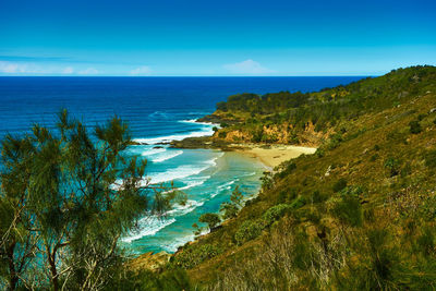 Scenic view of sea against clear blue sky