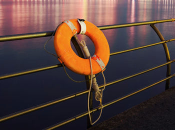 Close-up of rope tied on railing