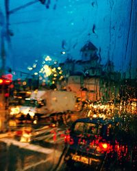 Close-up of rain drops on road