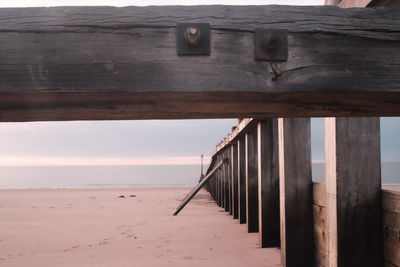 Pier over sea against sky