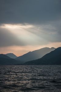 Scenic view of sea against cloudy sky