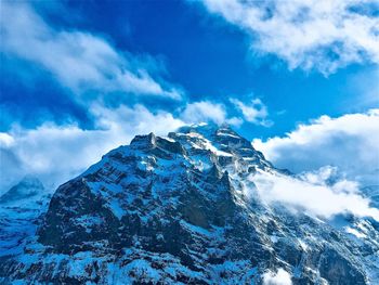 Snow covered mountain against sky