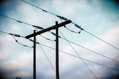 Low angle view of electricity pylon