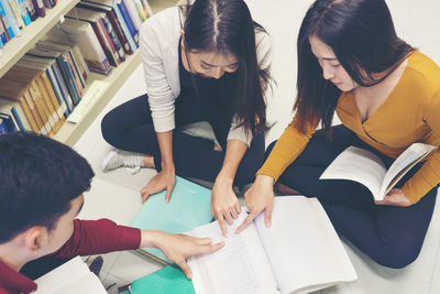 Students studying in library