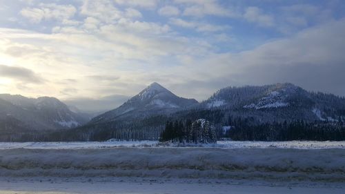 Scenic view of mountains against sky during winter