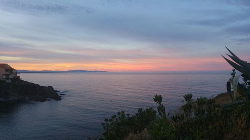 Scenic view of sea against sky during sunset
